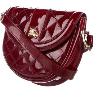 Authentic Burberry patent leather crossbody bag in very good condition.